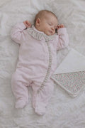 Babygrow e fralda com padrão florido